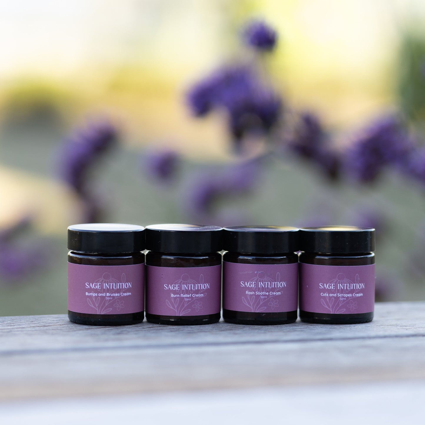 row of custom made creams sage intuition sitting on wood bench