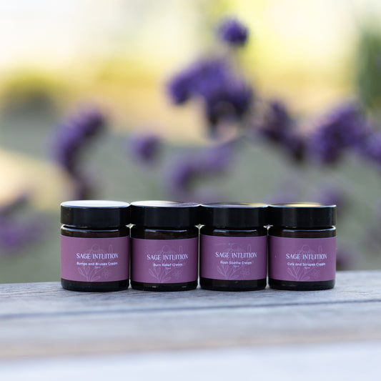 row of custom made creams sage intuition sitting on wood bench